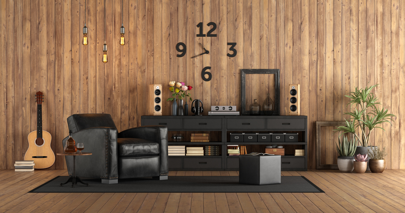 wood-paneling-in-a-living-area-with-vintage-decor-and-black-furnishings