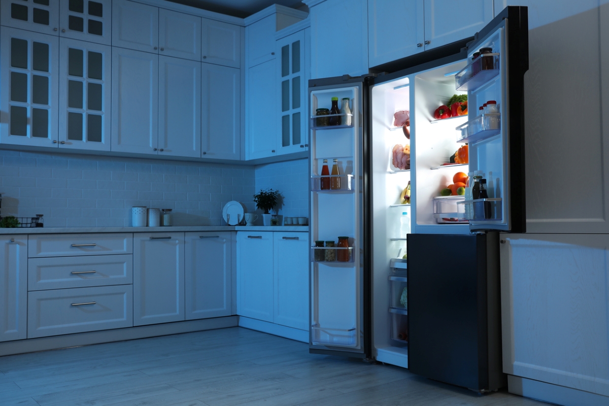 Open fridge at night