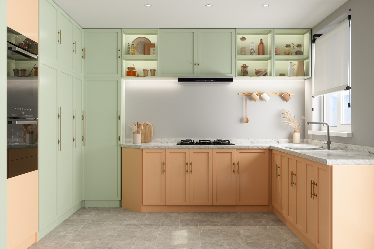 white-and-peach-kitchen-with-pale-green-pantry-doors