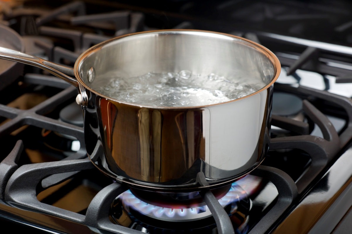 Metal pot of boiling water