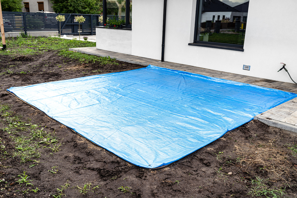 tarp covering concrete slab while it cures