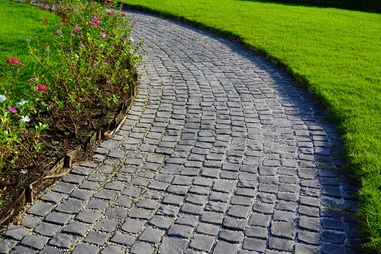 cobblestone pathway in home landscape