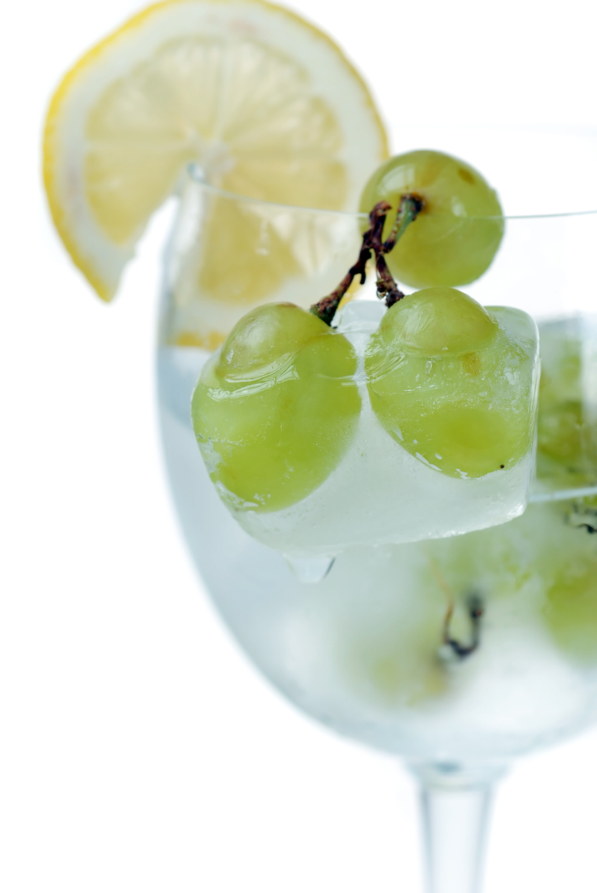 Frozen grapes in a drink