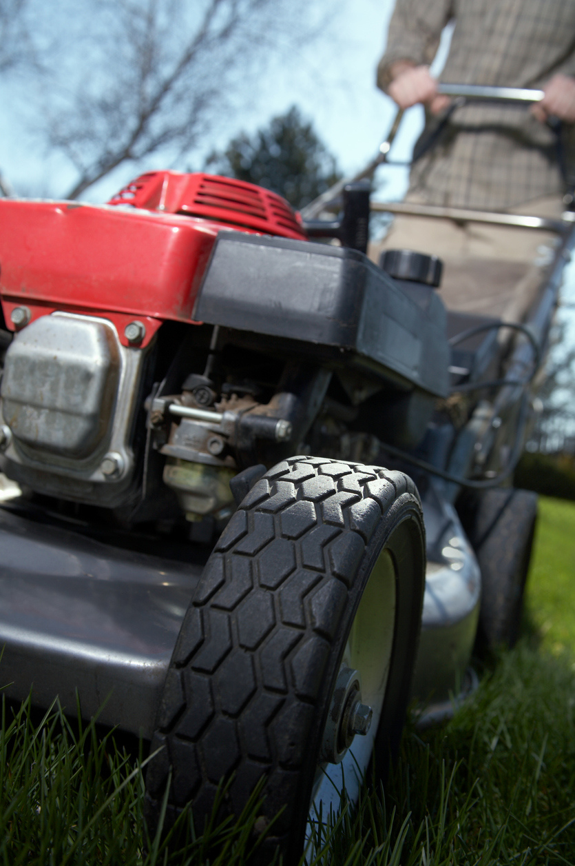 low angle view of lawnmower focused on tire