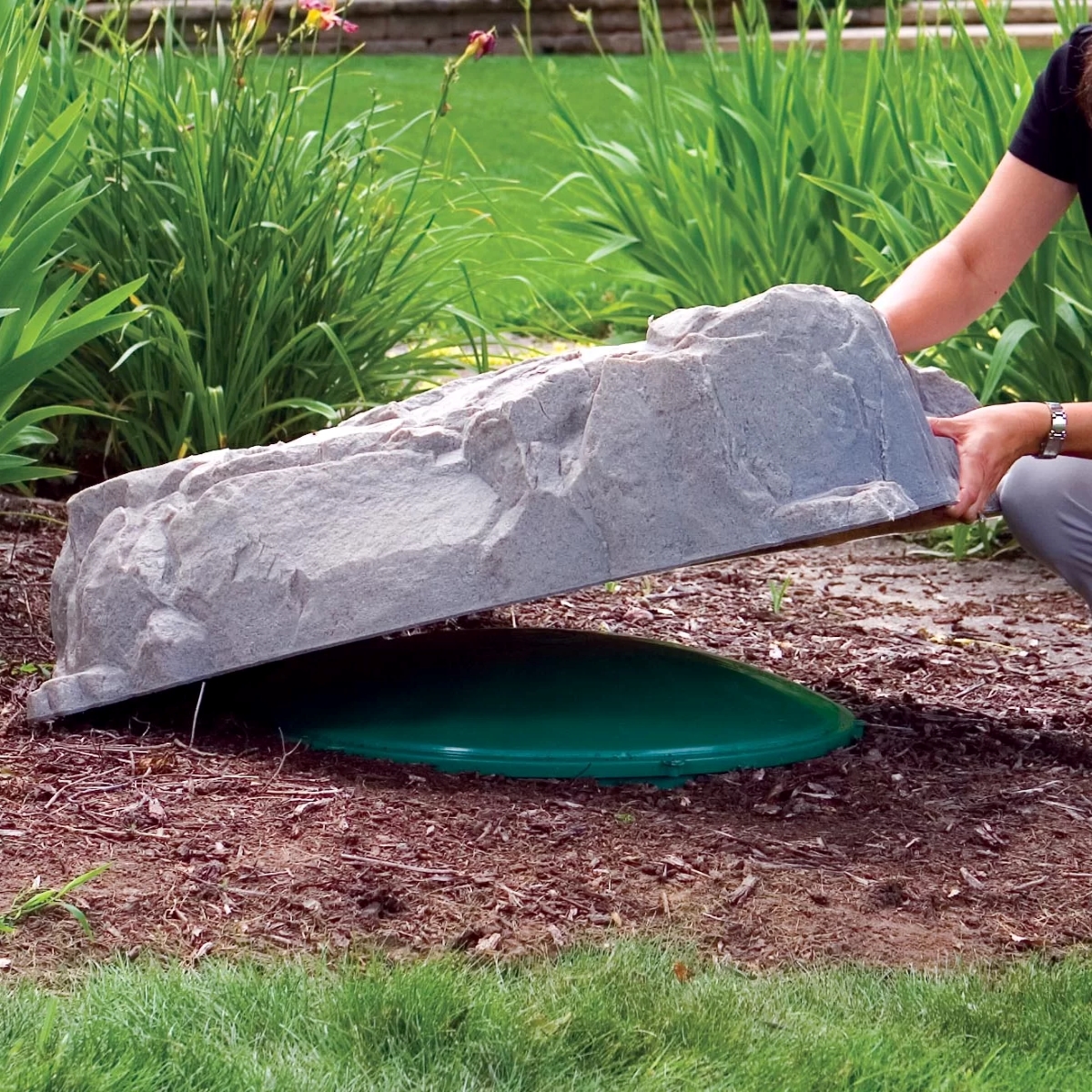 Large faux rock over septic tank lid