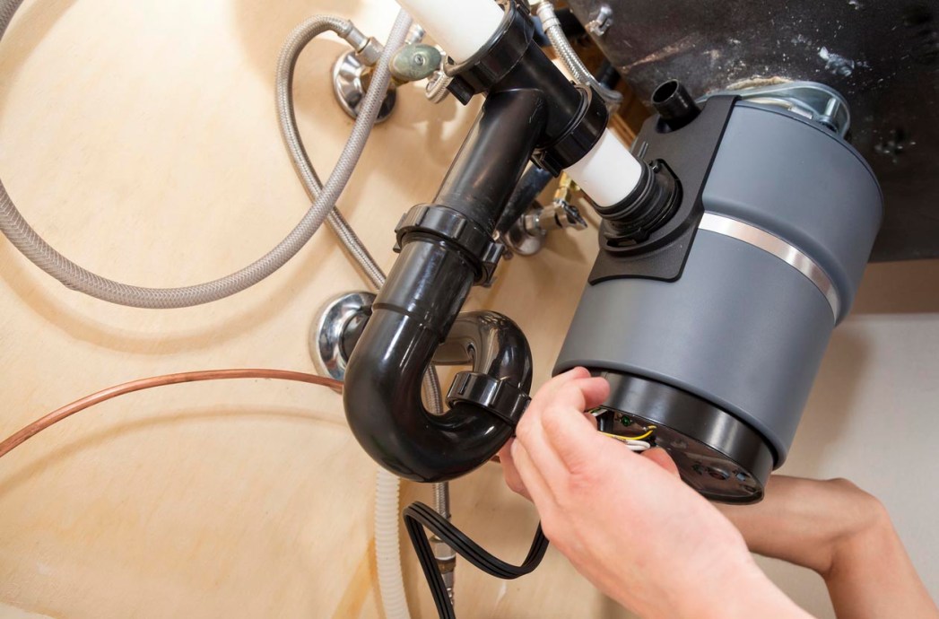 How Much Does Garbage Disposal Repair Cost? (2023) Bob Vila