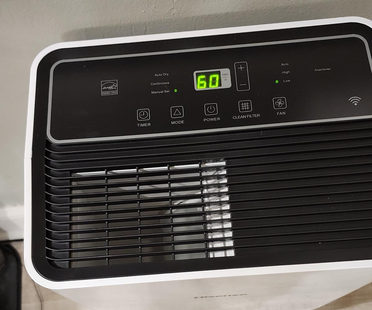 A top-down view of the Hisense wi-fi dehumidifier showing it's settings and controls