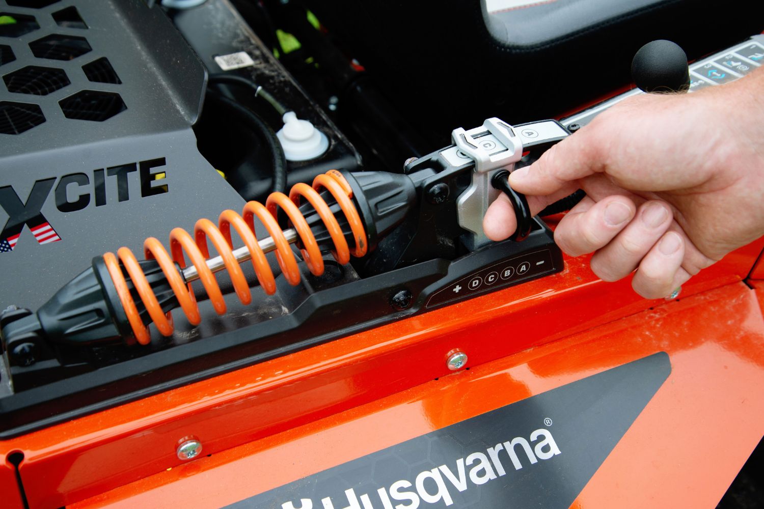 A close-up of the SmoothRide suspension system on the Husqvarna XCite 350 zero turn riding mower