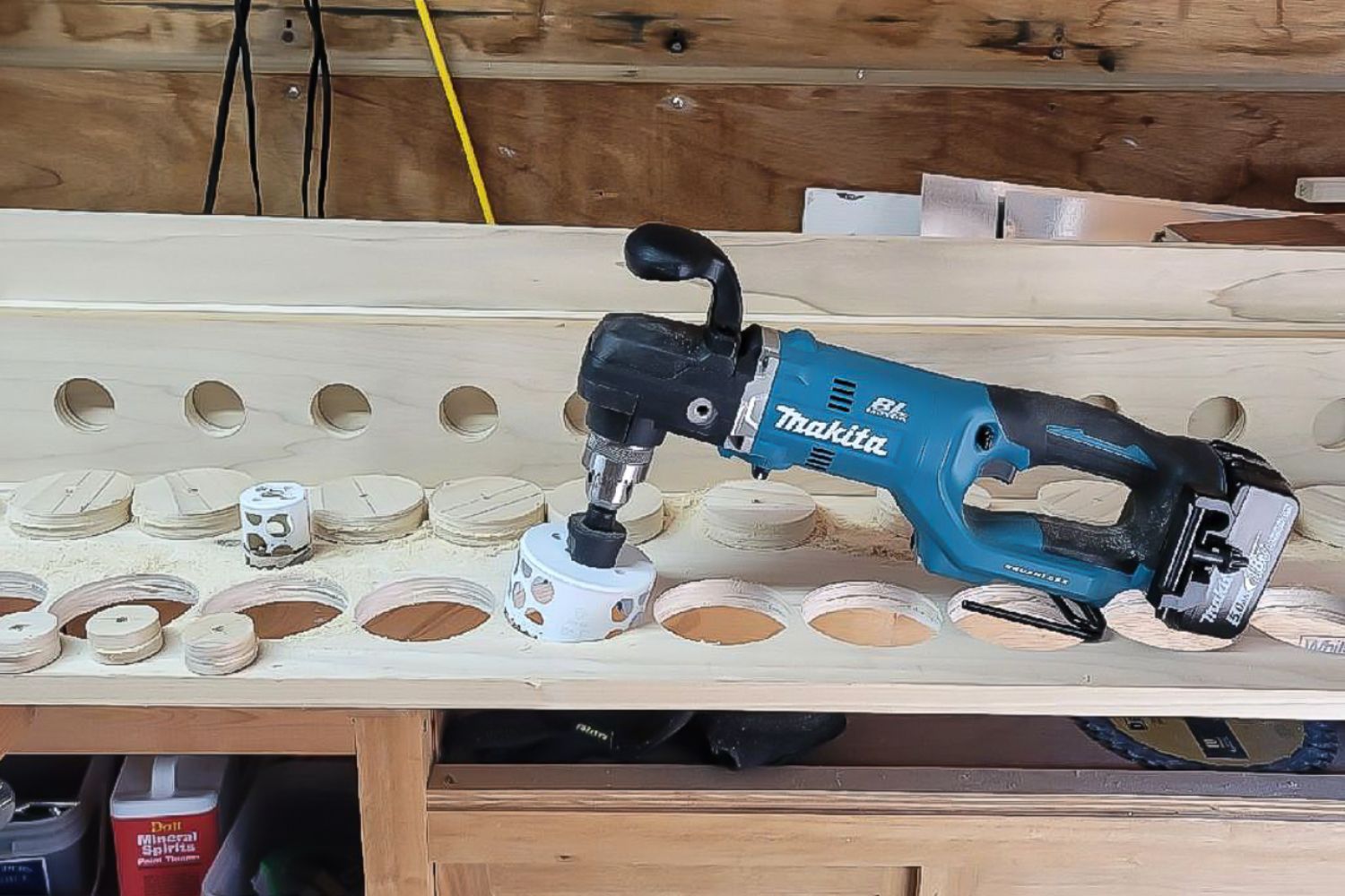 The Makita right-angle drill sitting on a workbench