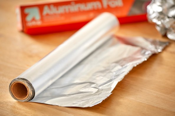 Aluminum foil roll on the counter, with the box in the background.