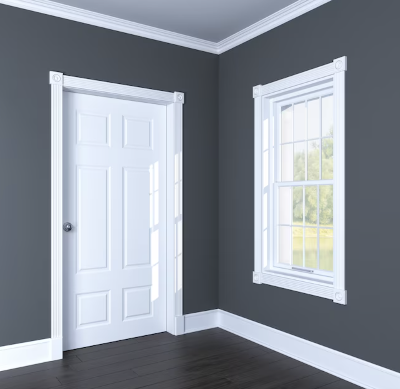 white casing around white door in a grey room