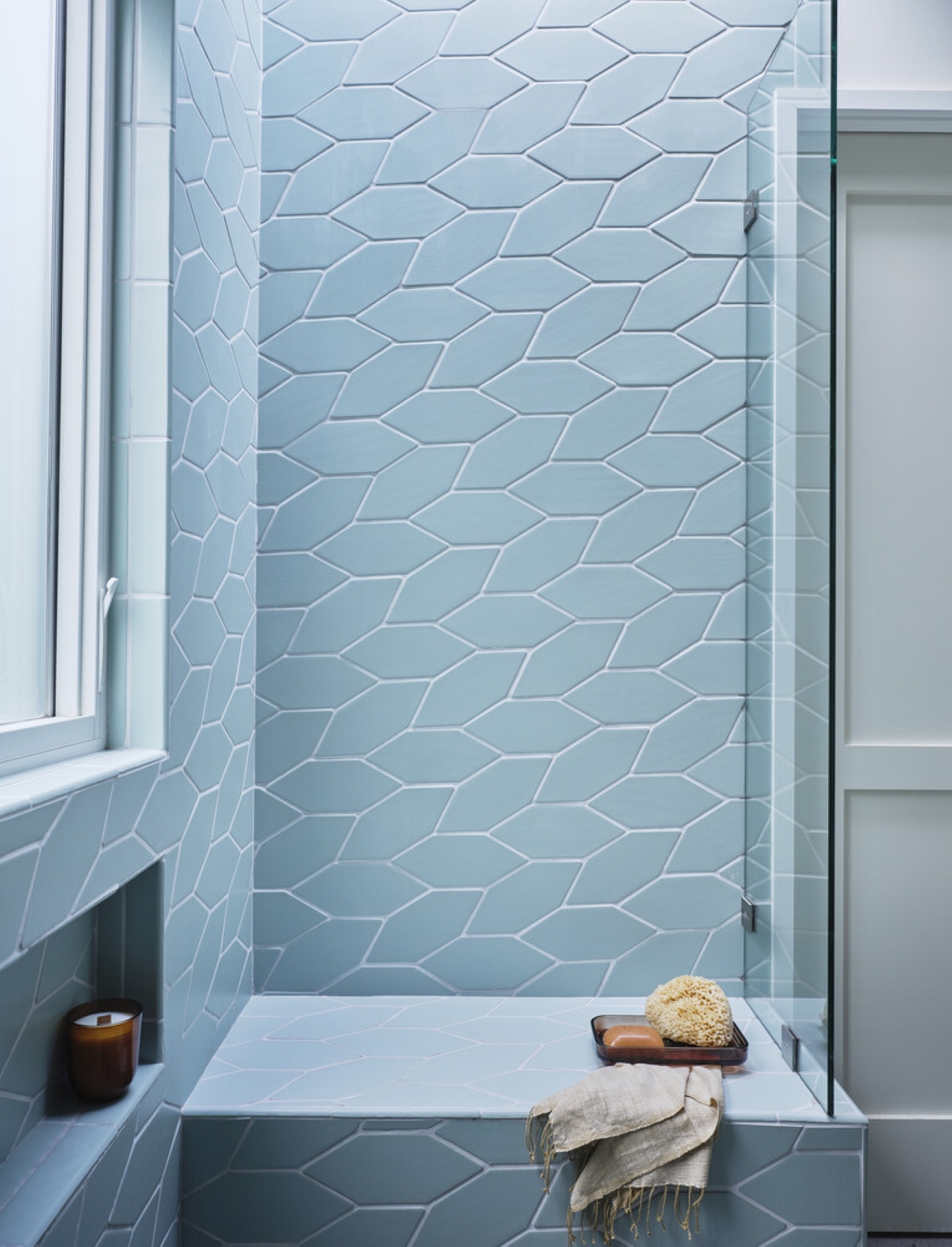 blue picket shaped tiles in bathroom