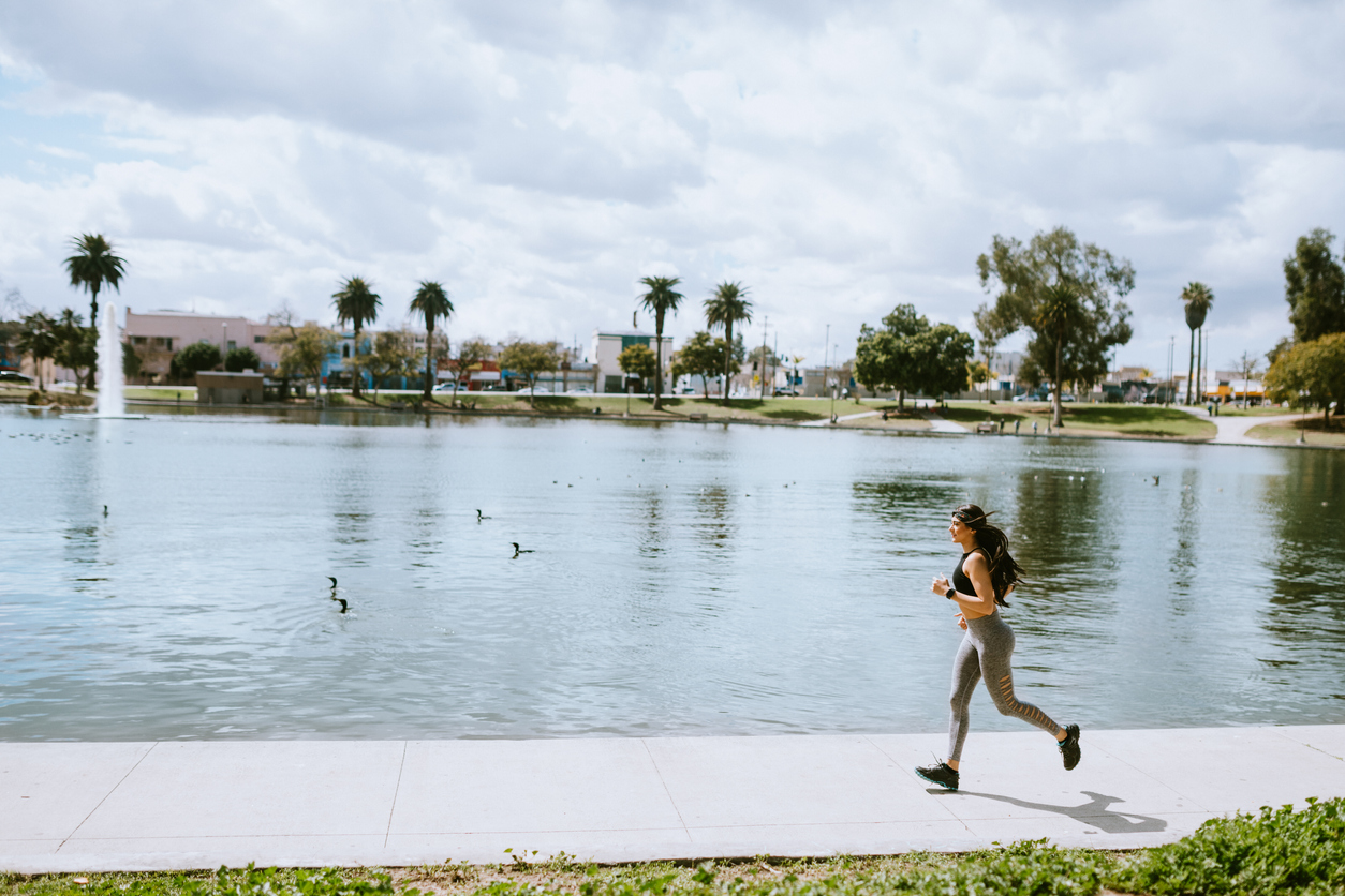 woman running in park in los angeles