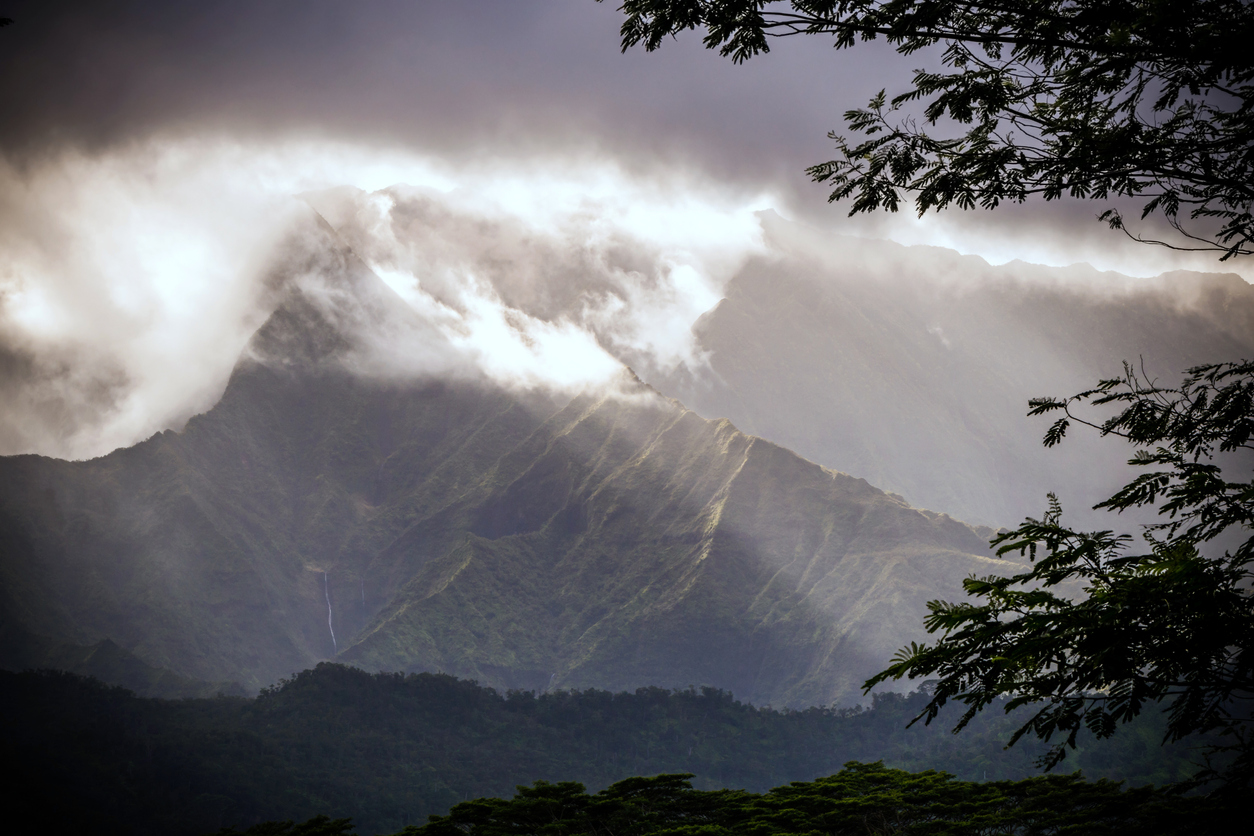 View of lush green Mount Waialeale shrouded in mist, the wettest spot on Earth
