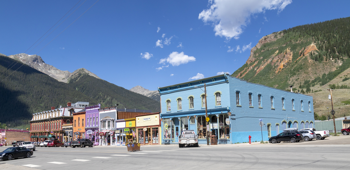 wide view of main street in silverton colorado with mountains in background