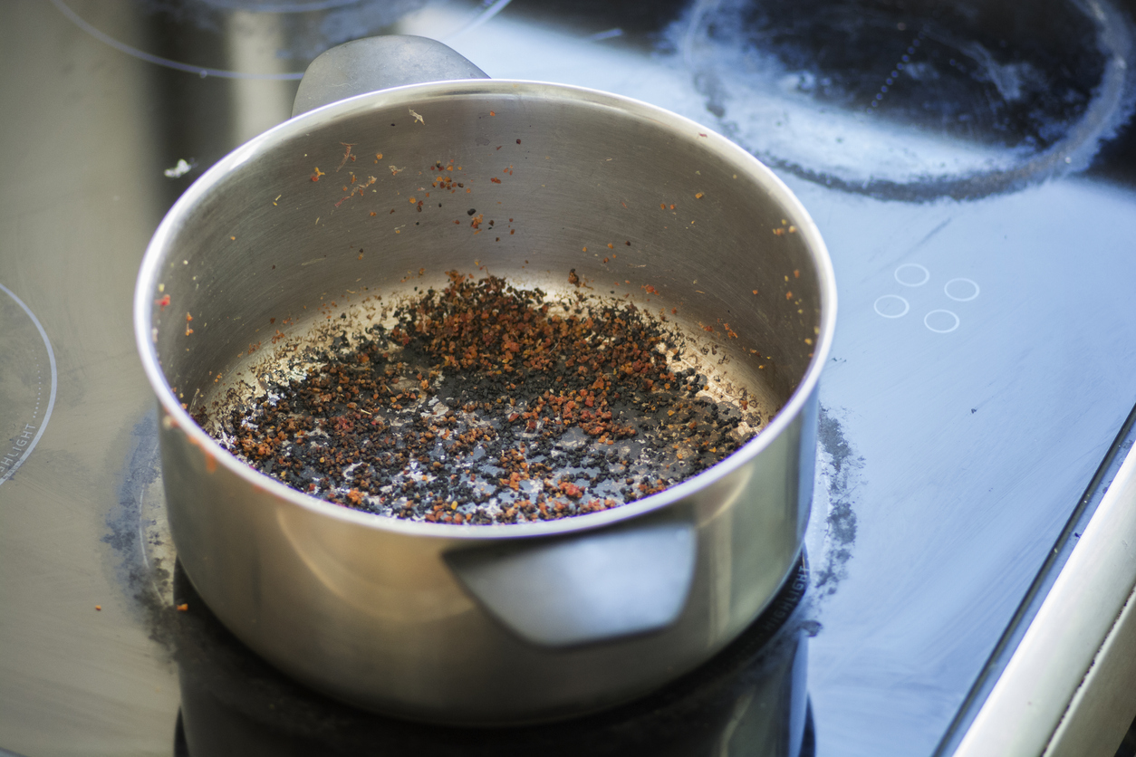 high angle view of burnt pot on stove