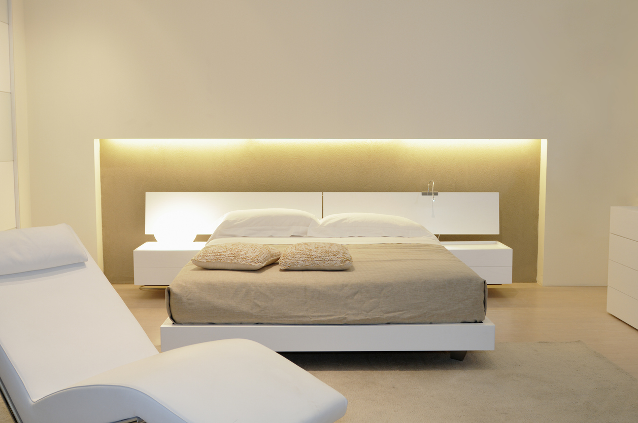 Bedroom with illuminated headboard