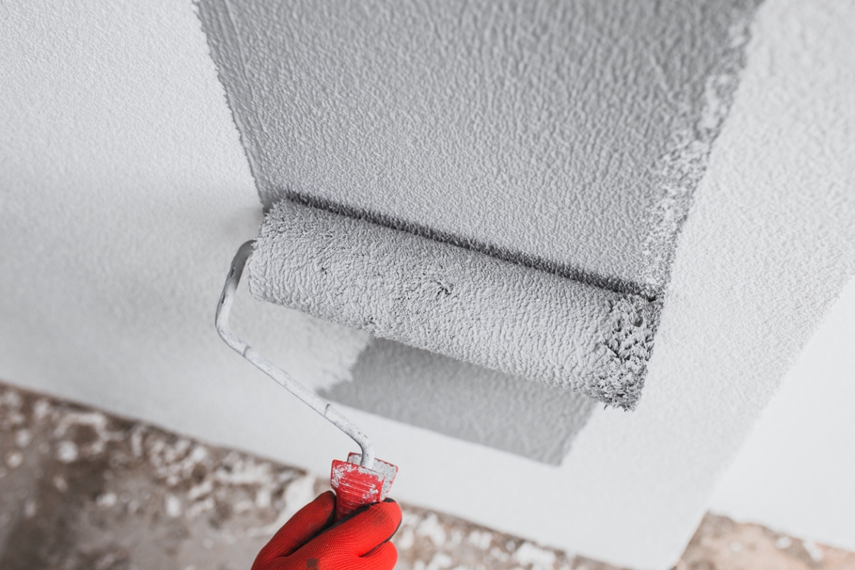 Painting wall gray with roller