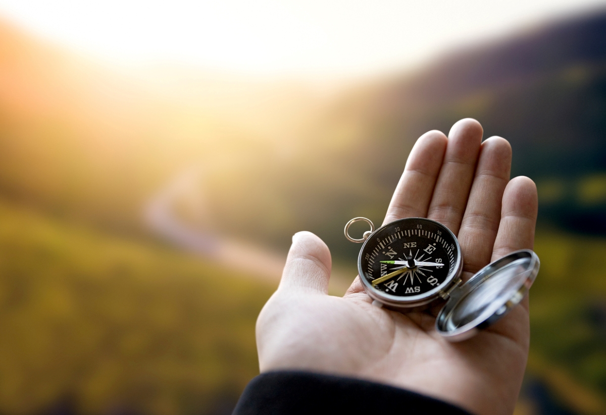 Person using compass