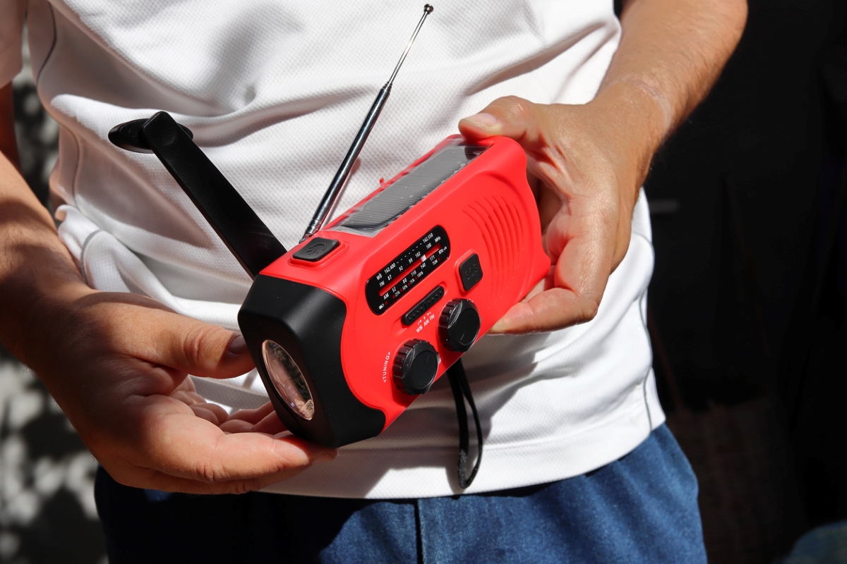 Person using hand radio