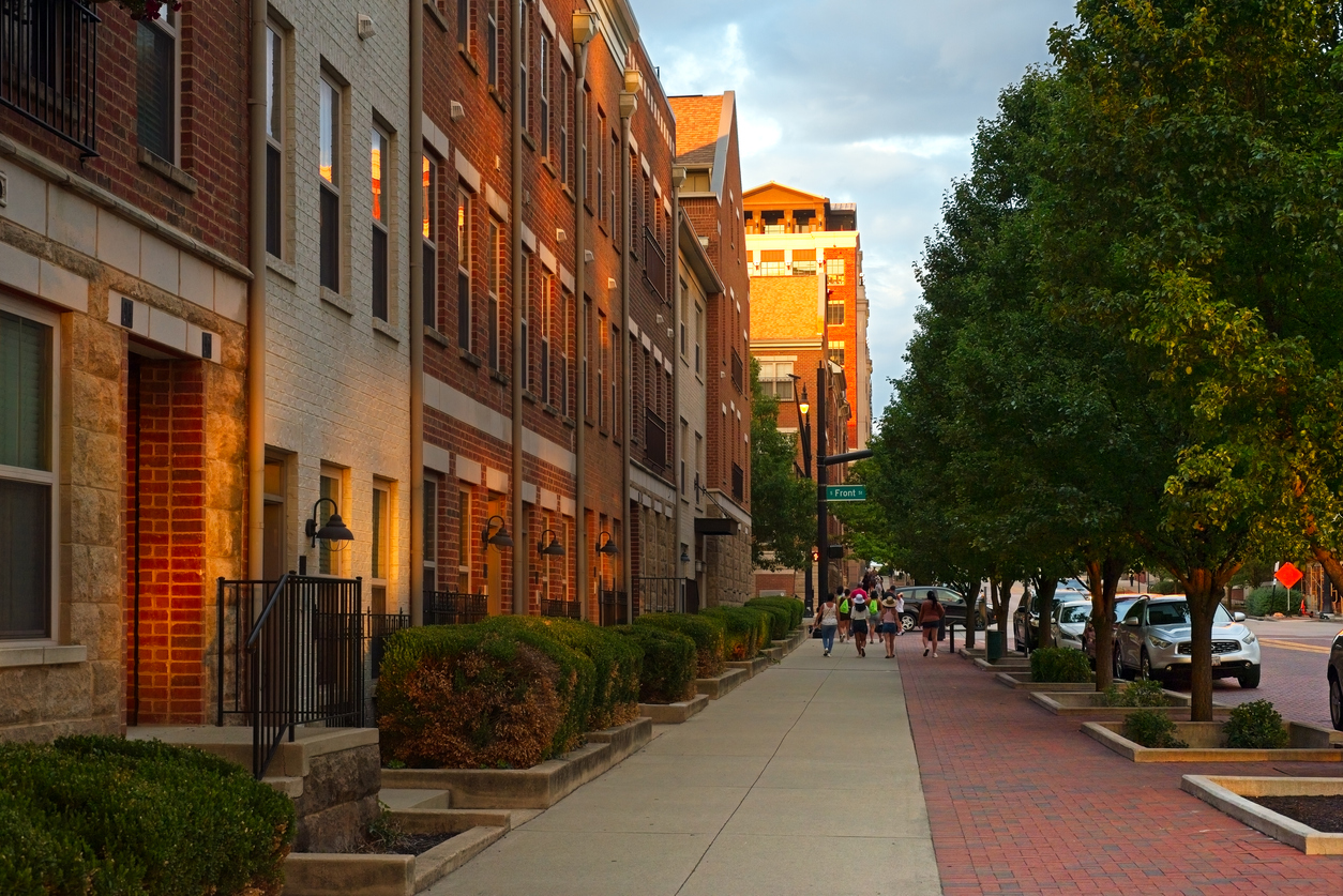 Columbus, OH, USA - August 12, 2023: A view east down West Rich Street a block from the Scioto River features renovated living spaces in an attractive urban setting.