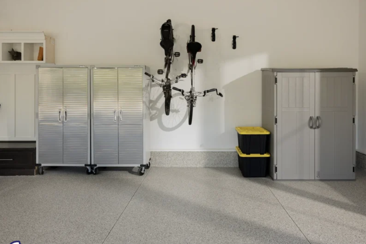A garage with a bike rack and Polyaspartic Coating
on the floors.