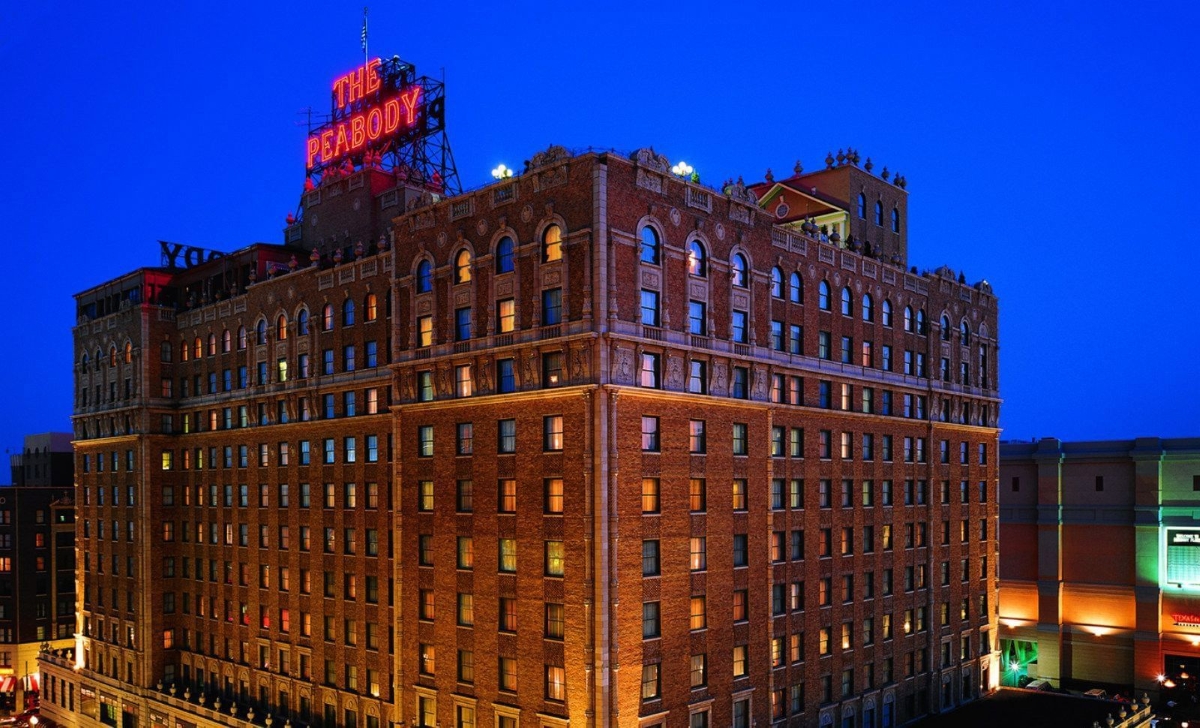 Exterior view of large hotel building at night