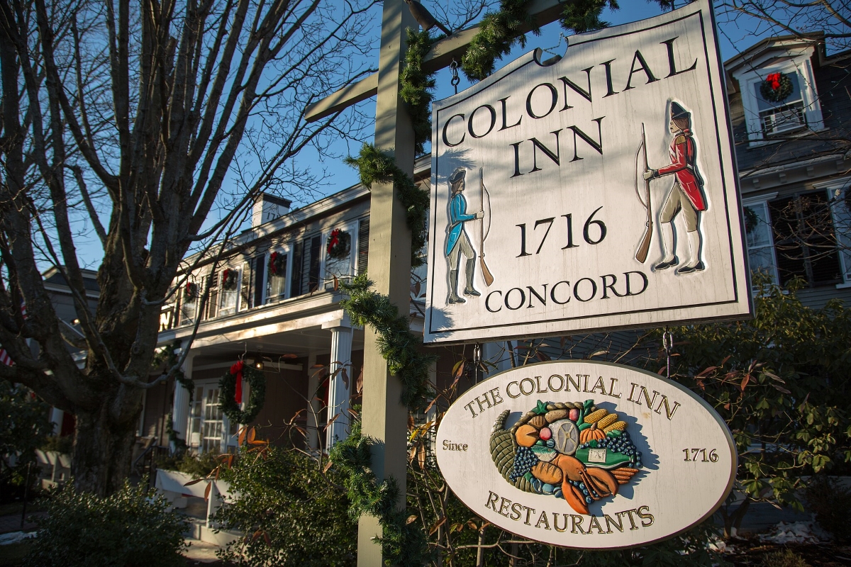 Colonial Inn sign in front of building