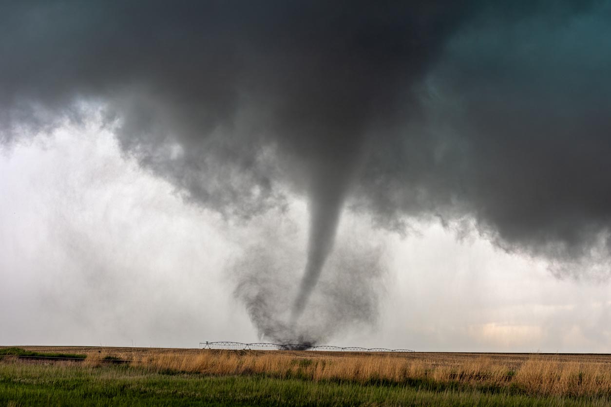 A tornado in a field.