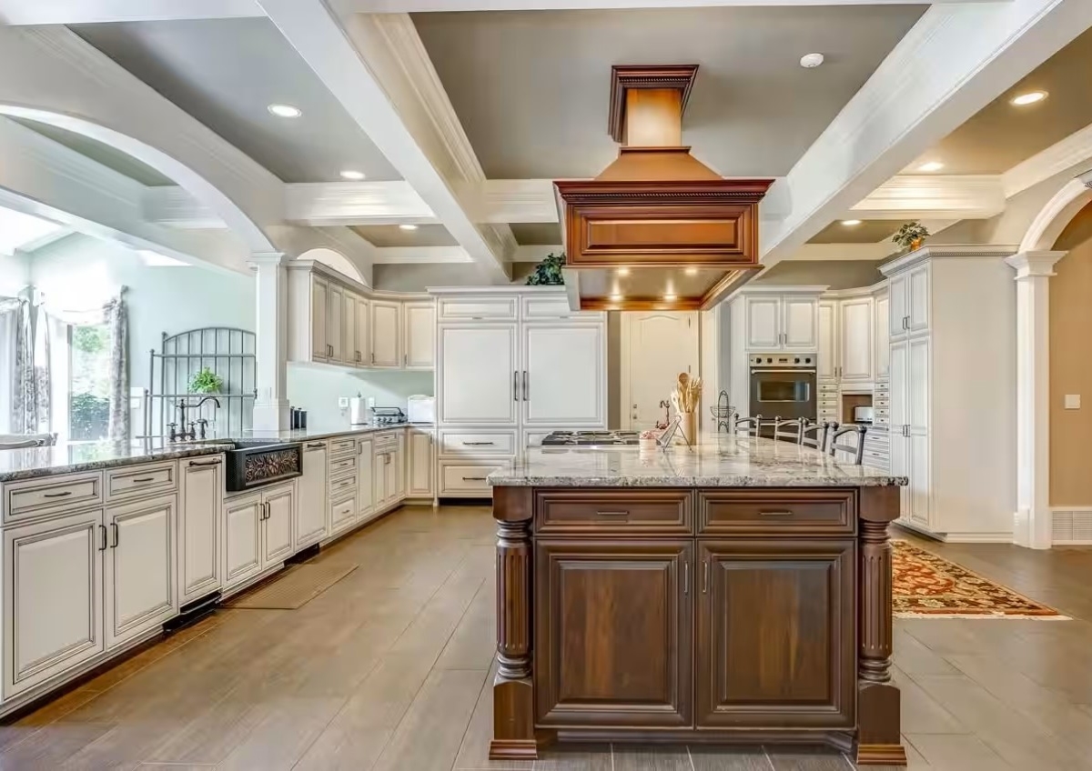 Neutral kitchen with coffered ceiling