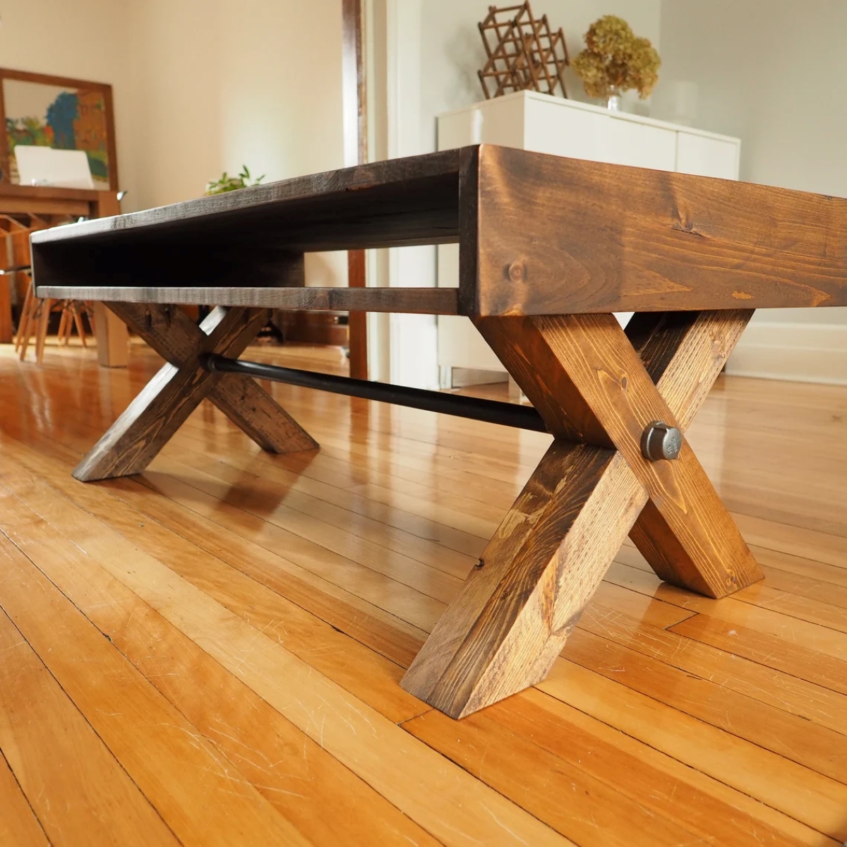 Large X-leg wooden table.