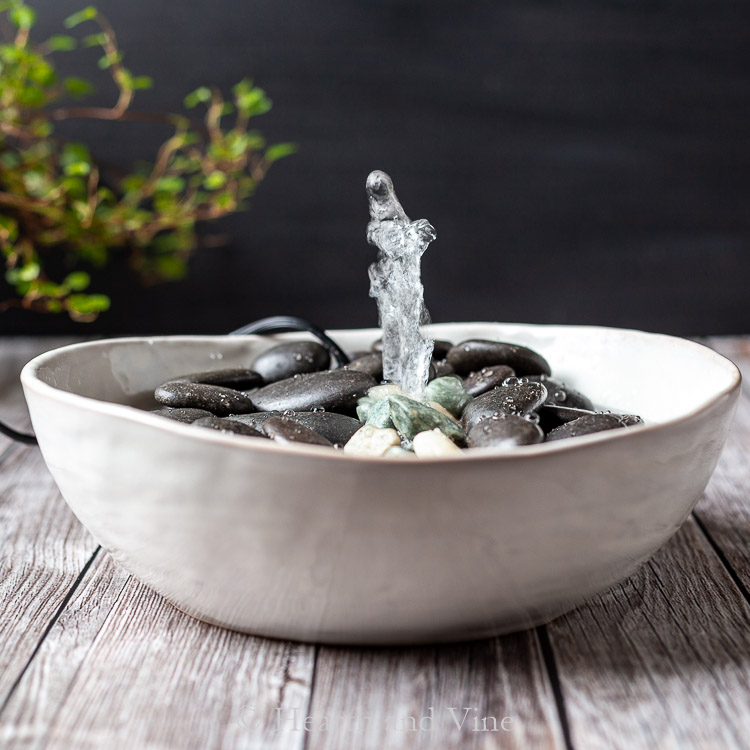 mini water fountain with stones