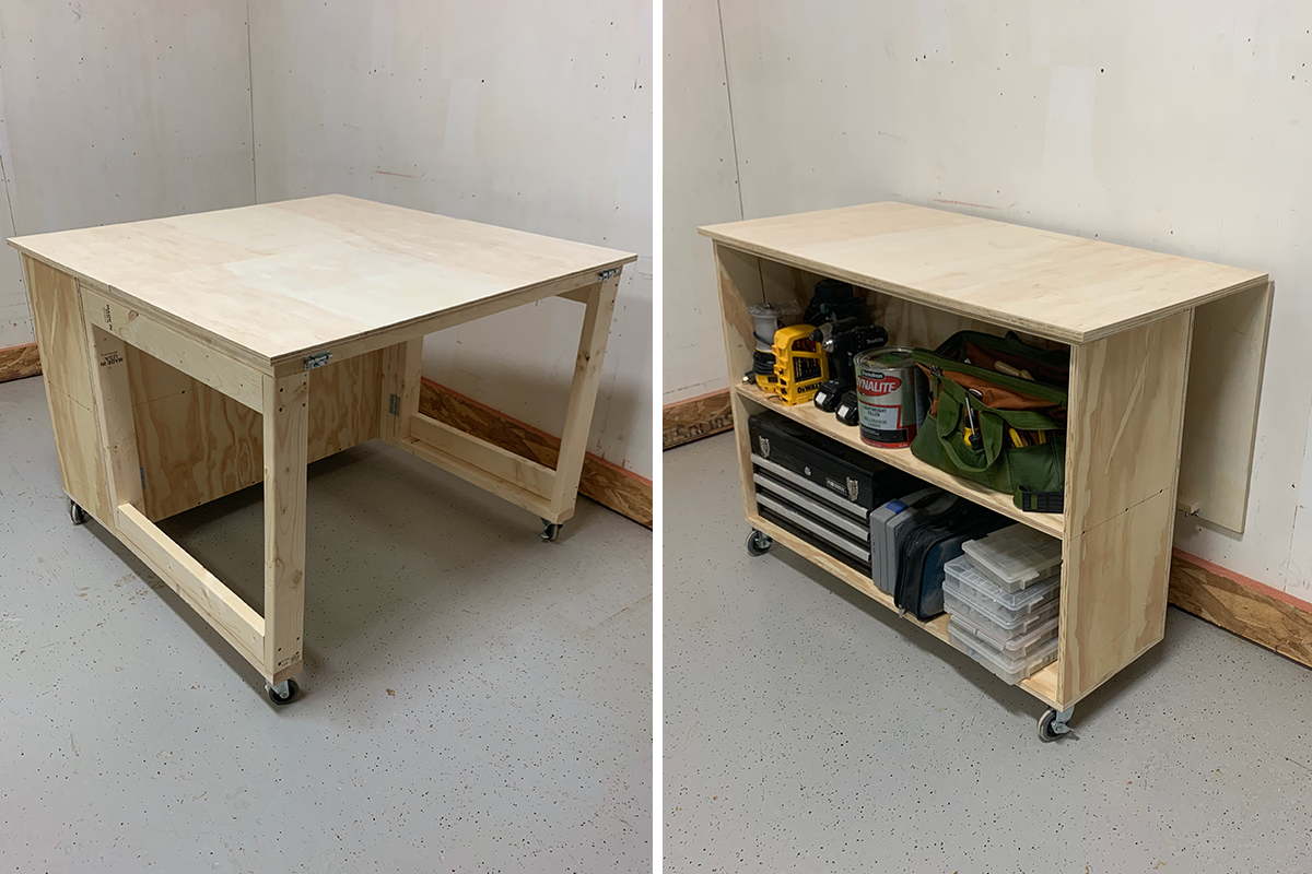 A DIY workbench with collapsible bench top and casters and an open cabinet in a clean garage.