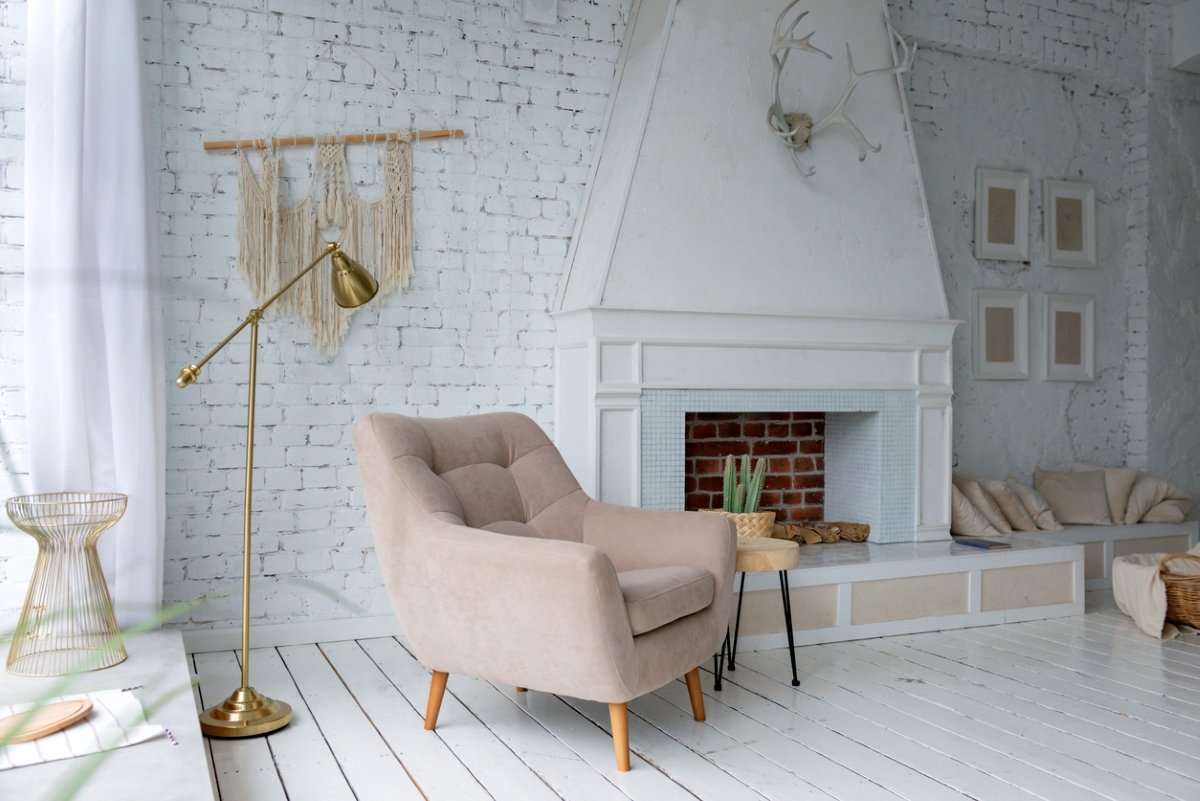 Living room with painted white brick wall