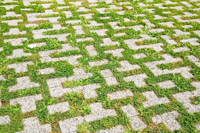 permeable pavers and grass driveway in residential neighborhood