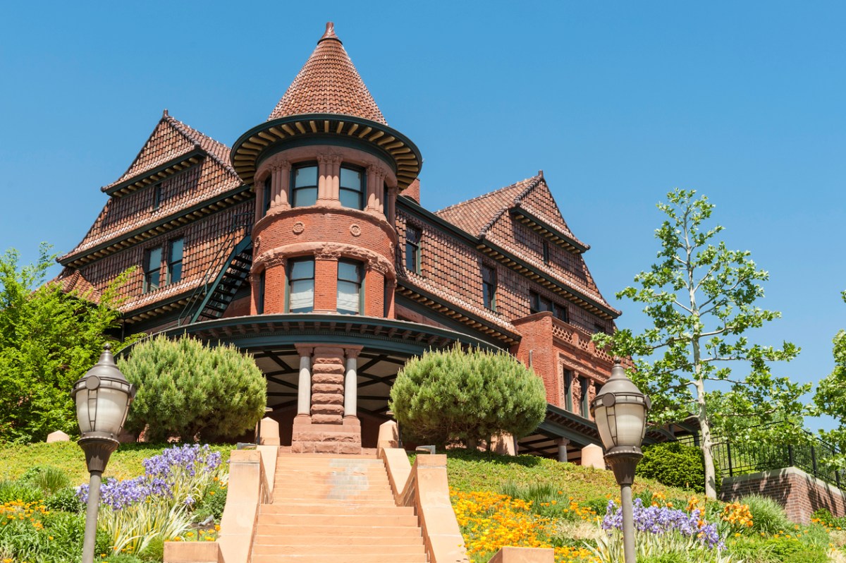 "Clear blue desert skies over the gothic turrets and colorful gardens of the historic Alfred McCune mansion building on Capitol Hill in dowtown Salt Lake City, Utah. ProPhoto RGB profile for maximum color fidelity and gamut."