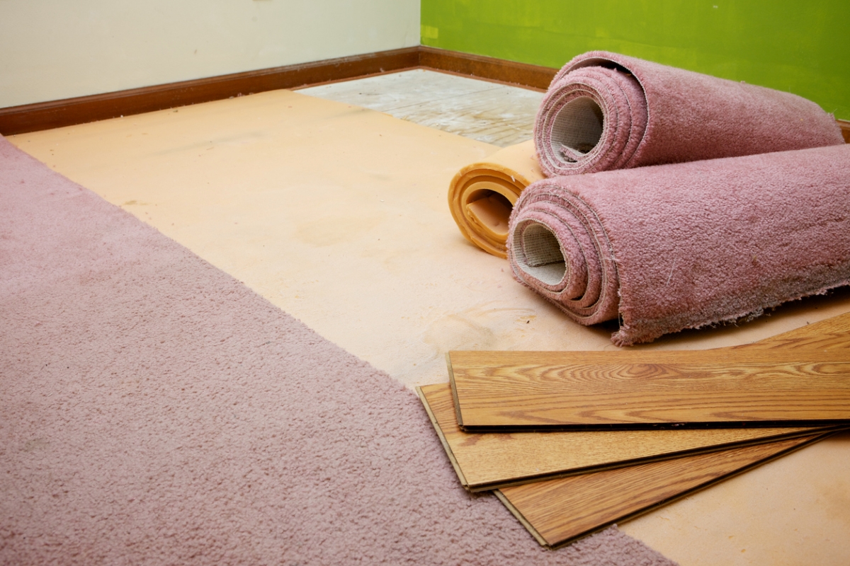 Rolls of removed pink carpet