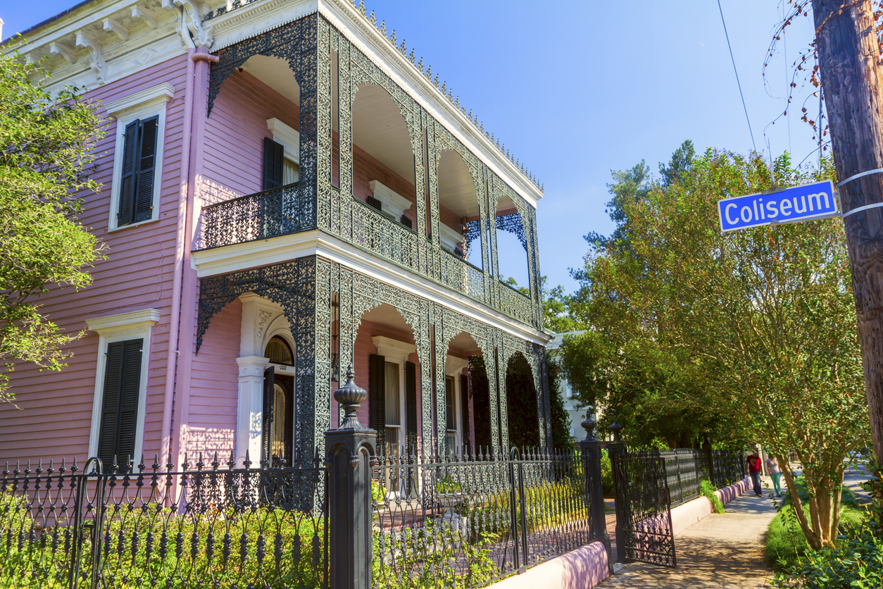 mansion on foreground in New Orleans' Garden district