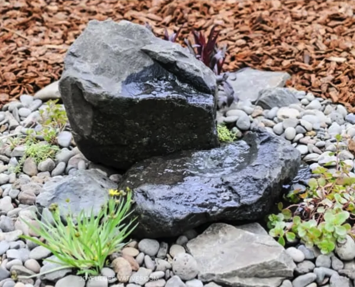 rock fountain in landscaping