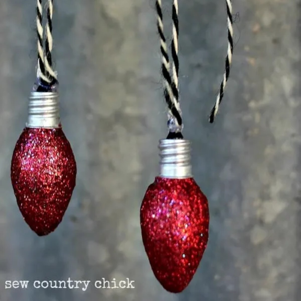 Small light bulb painted in red glitter