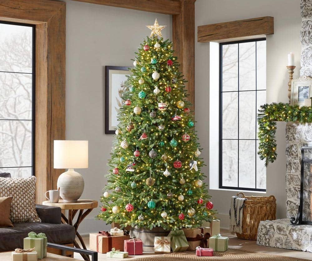 The Home Accents Holiday Jackson Noble Christmas Tree in a living room decorated for the holidays.