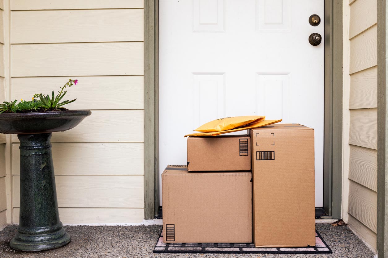 Packages sit at the front door.