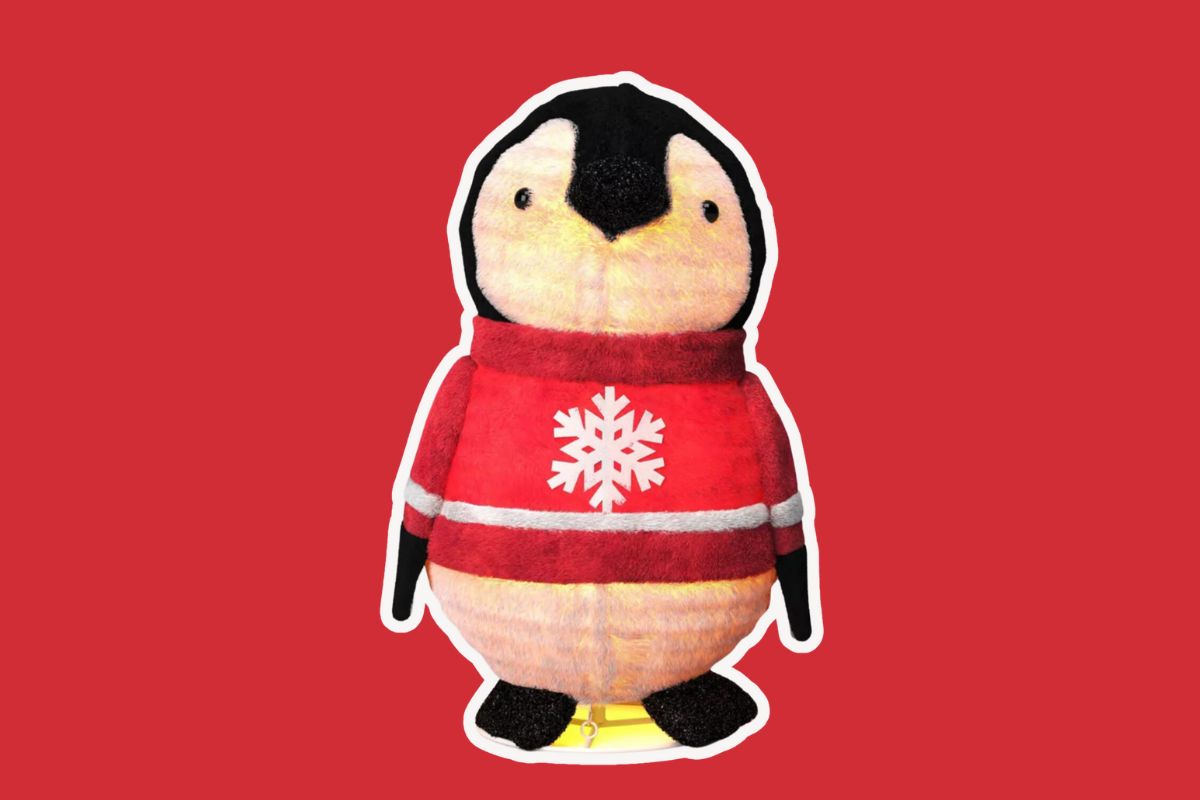 Light-Up Sculpture of a Penguin in a Red Holiday Sweater