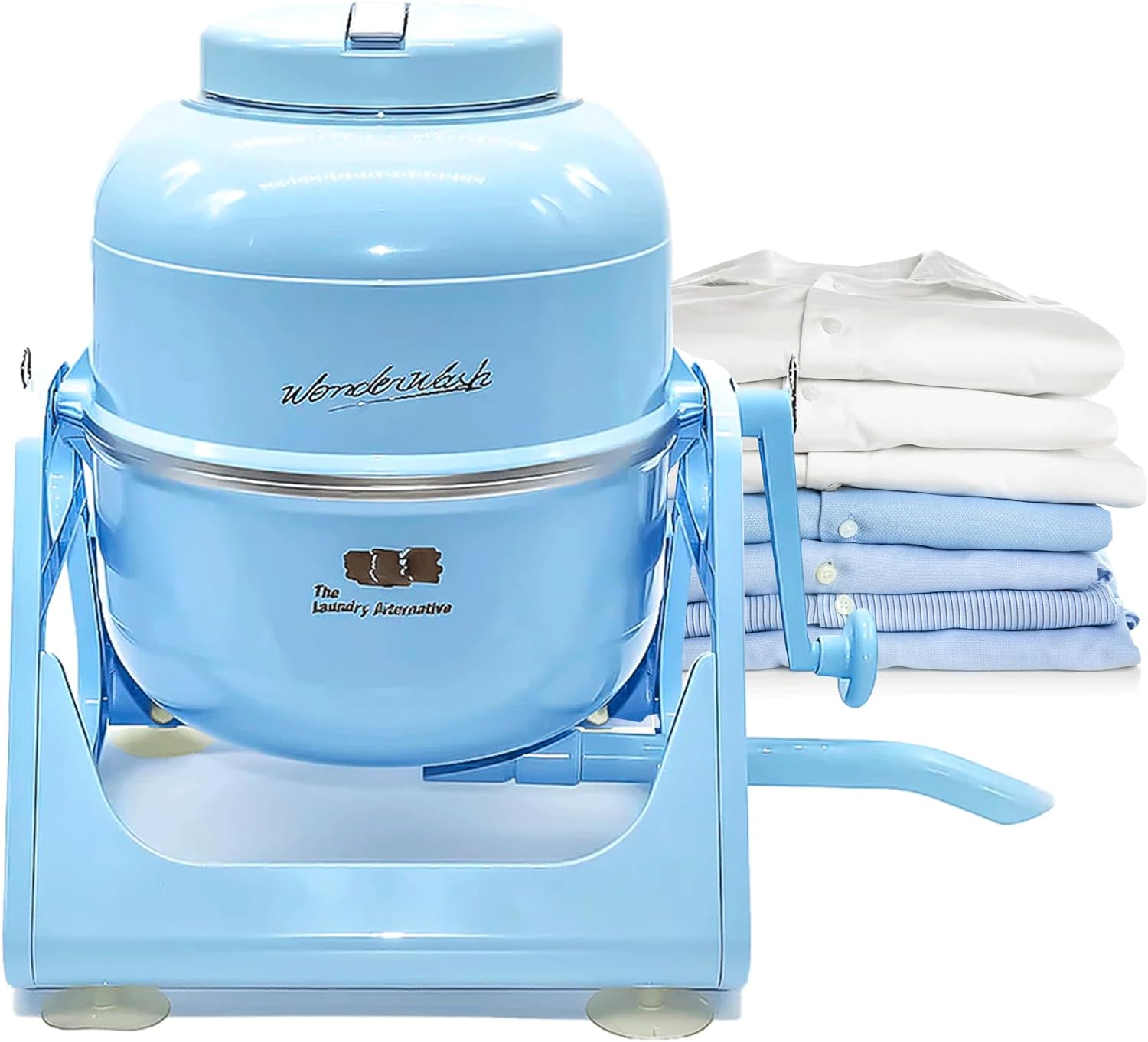 A light blue manual washing machine with hand crank sits next to a stack of folded laundry.