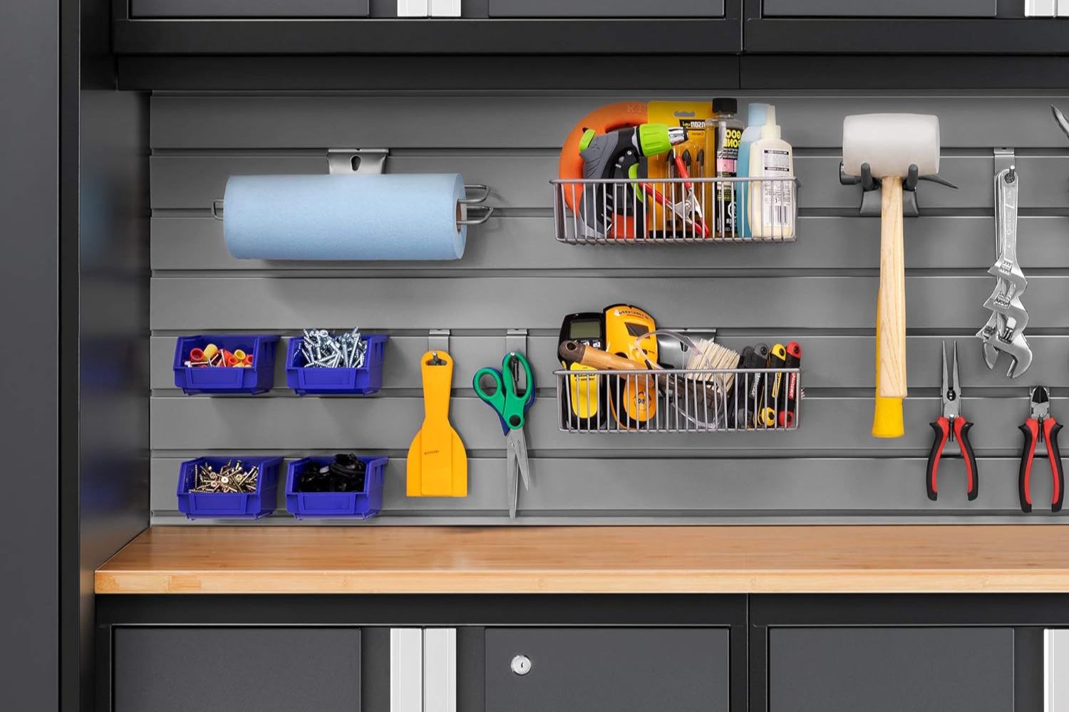 The best garage storage system installed in a garage and filled with a huge variety of tools and utensils.