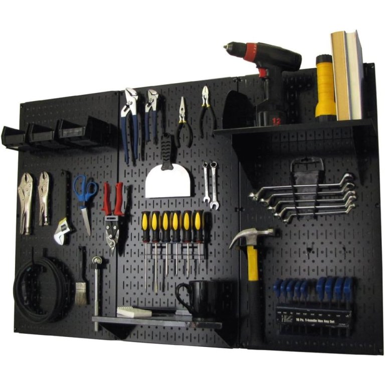  The Wall Control Metal Pegboard Standard Tool Storage Kit on a white background loaded with hand and power tools.