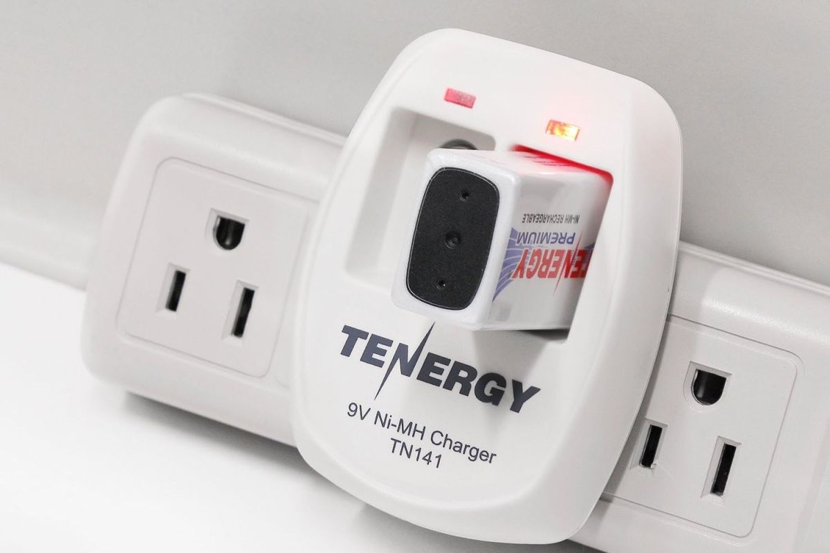The Tenergy TN141 Smart 2-Bay 9V NiMH Battery Charger plugged in and charging a 9V battery.