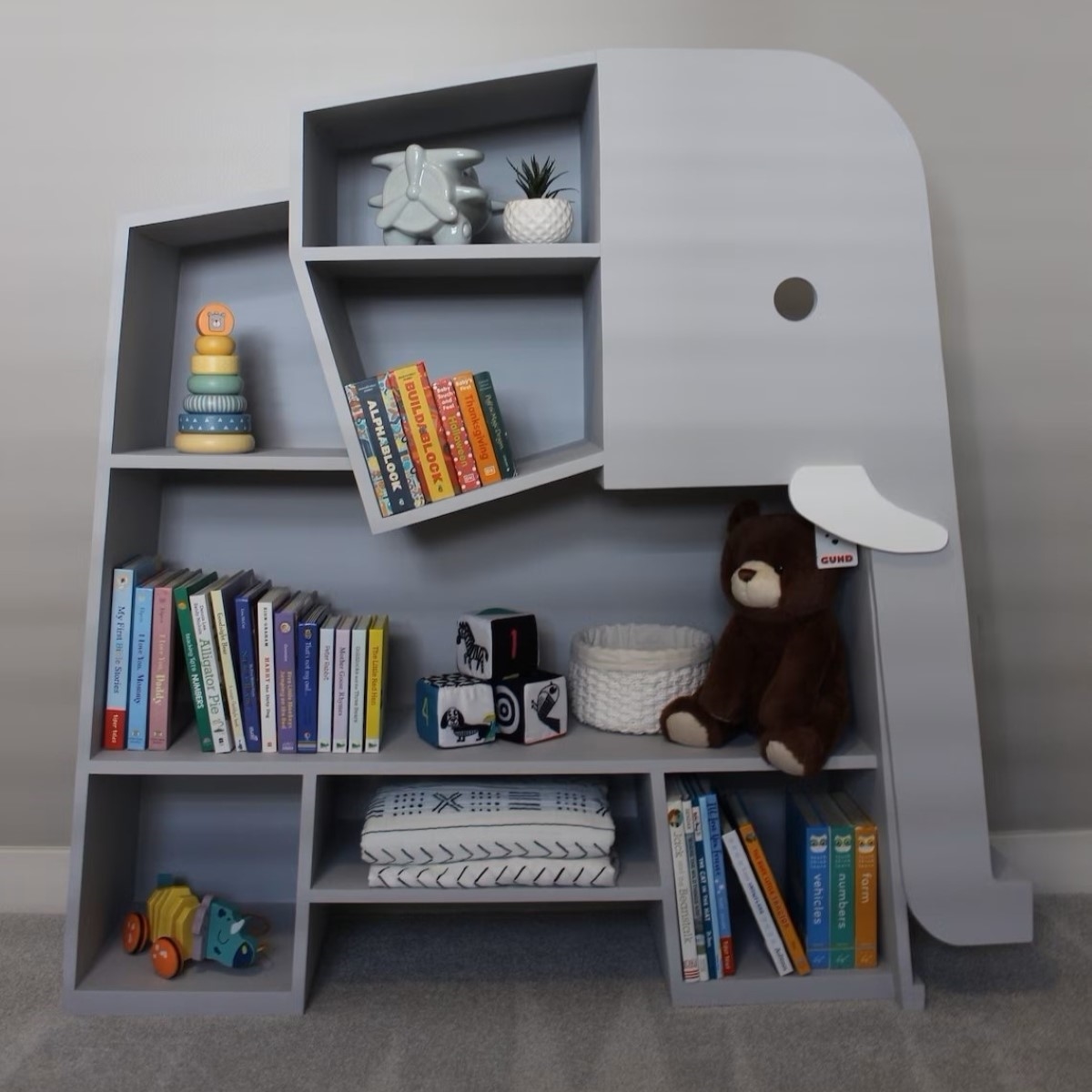 Elephant shaped bookshelf.