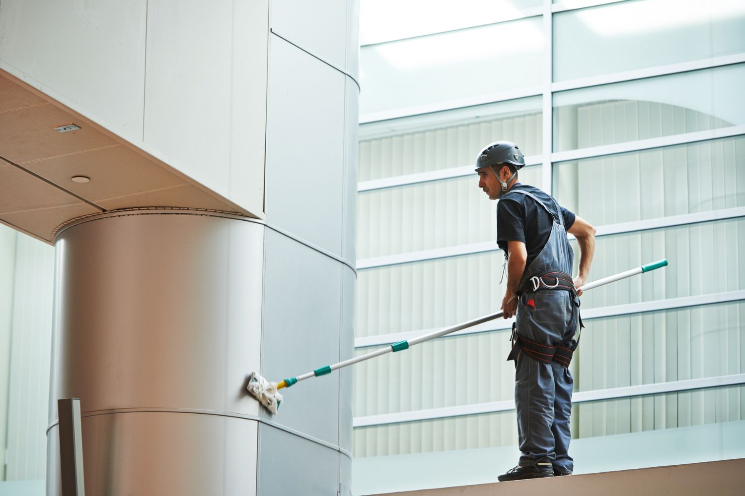 How to Get Clients for a Cleaning Business: Cleaning expert applyingmethods for thorough cleaning