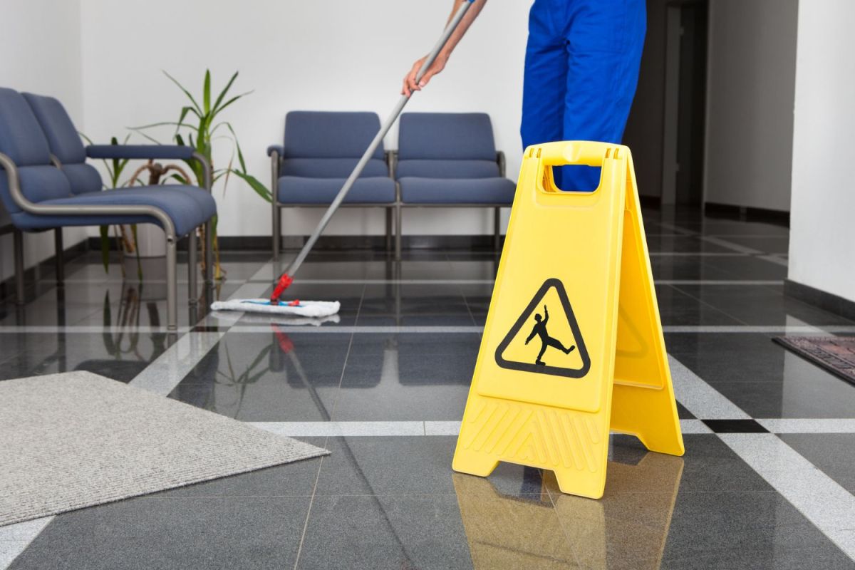 How to Get Clients for a Cleaning Business: cleaning specialist ensuring a clean and tidy space